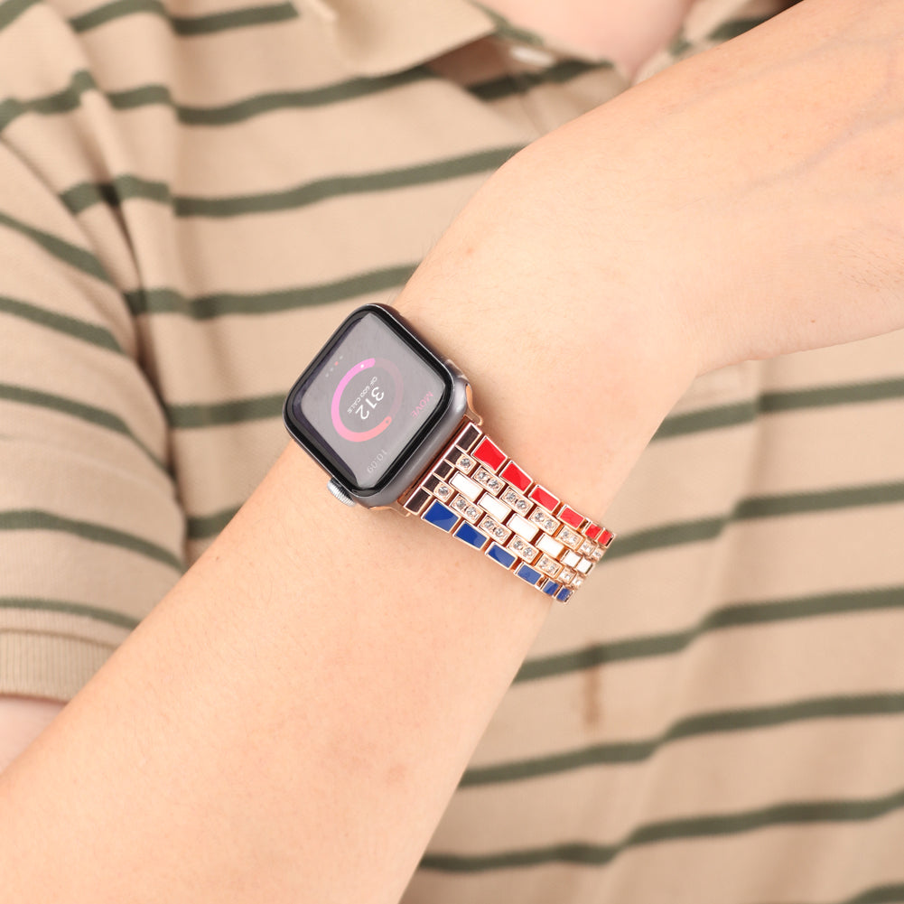 For Apple Watch Ultra 49mm / Series 8 45mm / 7 45mm / Series 6 / 5 / 4 / SSE 44mm / SE (2022) 44mm / Series 3 / 2 / 1 42mm Flag Style Watch Strap Rhinestone Band Replacement - Red / Blue / Rose Gold - UNIQBUY