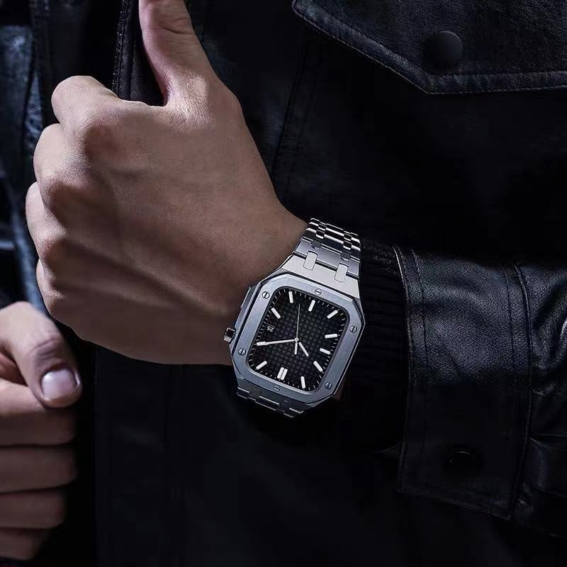 a person holding a cell phone in their hand