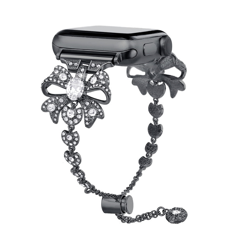 For Apple Watch Series 8 / 7 41mm / 6 / 5 / 4 / SE / SE (2022) 40mm / 3 / 2 / 1 38mm Rhinestones Decor Bowknot Bracelet Metal Watch Strap Adjustable Wrist Band - Black - UNIQBUY