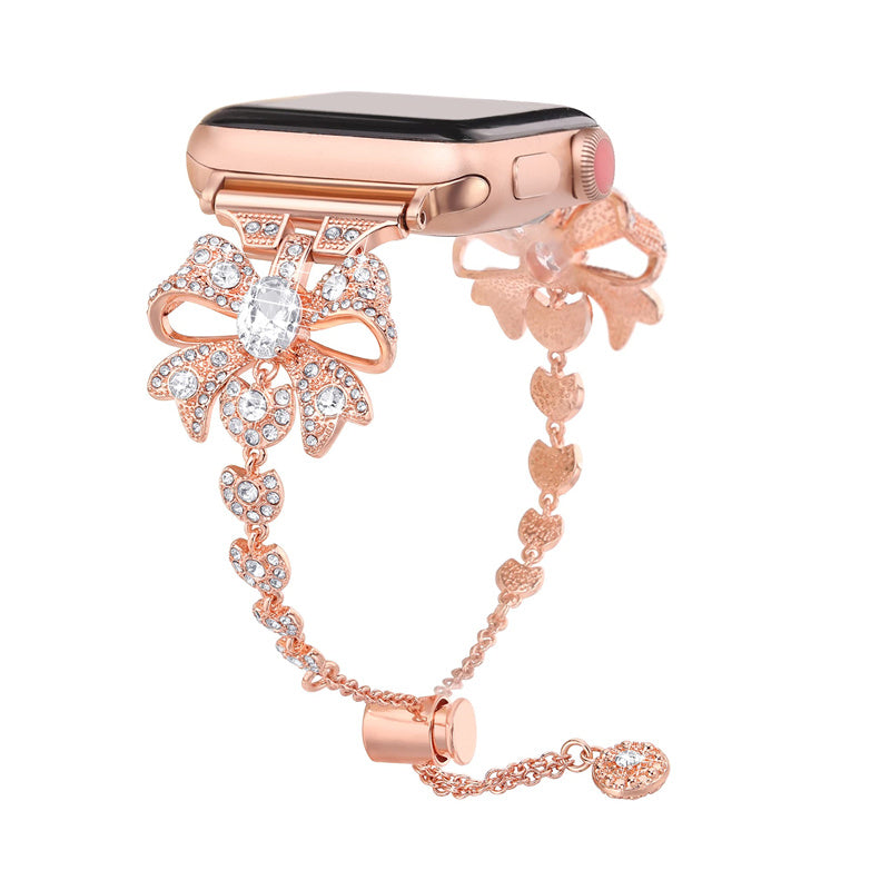 For Apple Watch Series 8 / 7 41mm / 6 / 5 / 4 / SE / SE (2022) 40mm / 3 / 2 / 1 38mm Rhinestones Decor Bowknot Bracelet Metal Watch Strap Adjustable Wrist Band - Rose Gold - UNIQBUY