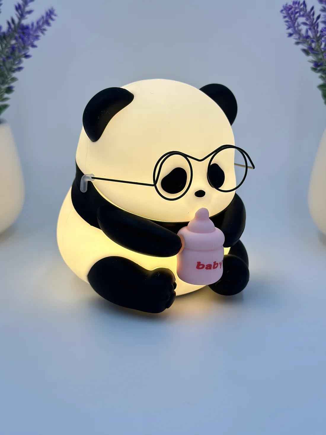 Panda LED Night Light with glasses and bottle design—soft silicone, rechargeable, and portable for kids’ rooms, nurseries, or baby shower gifts.