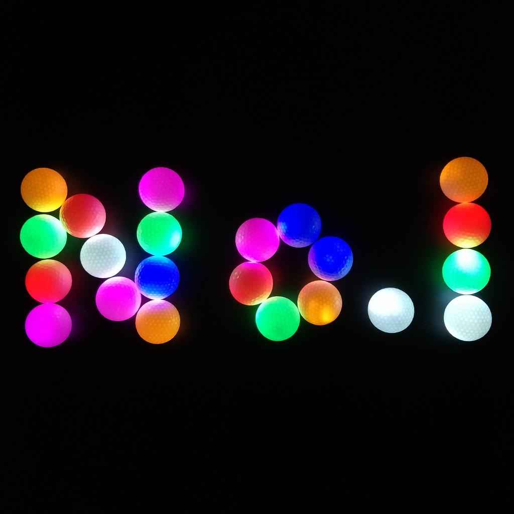 Glow In Dark Colorful LED Light Up Golf Ball Official Size Tournament Ball