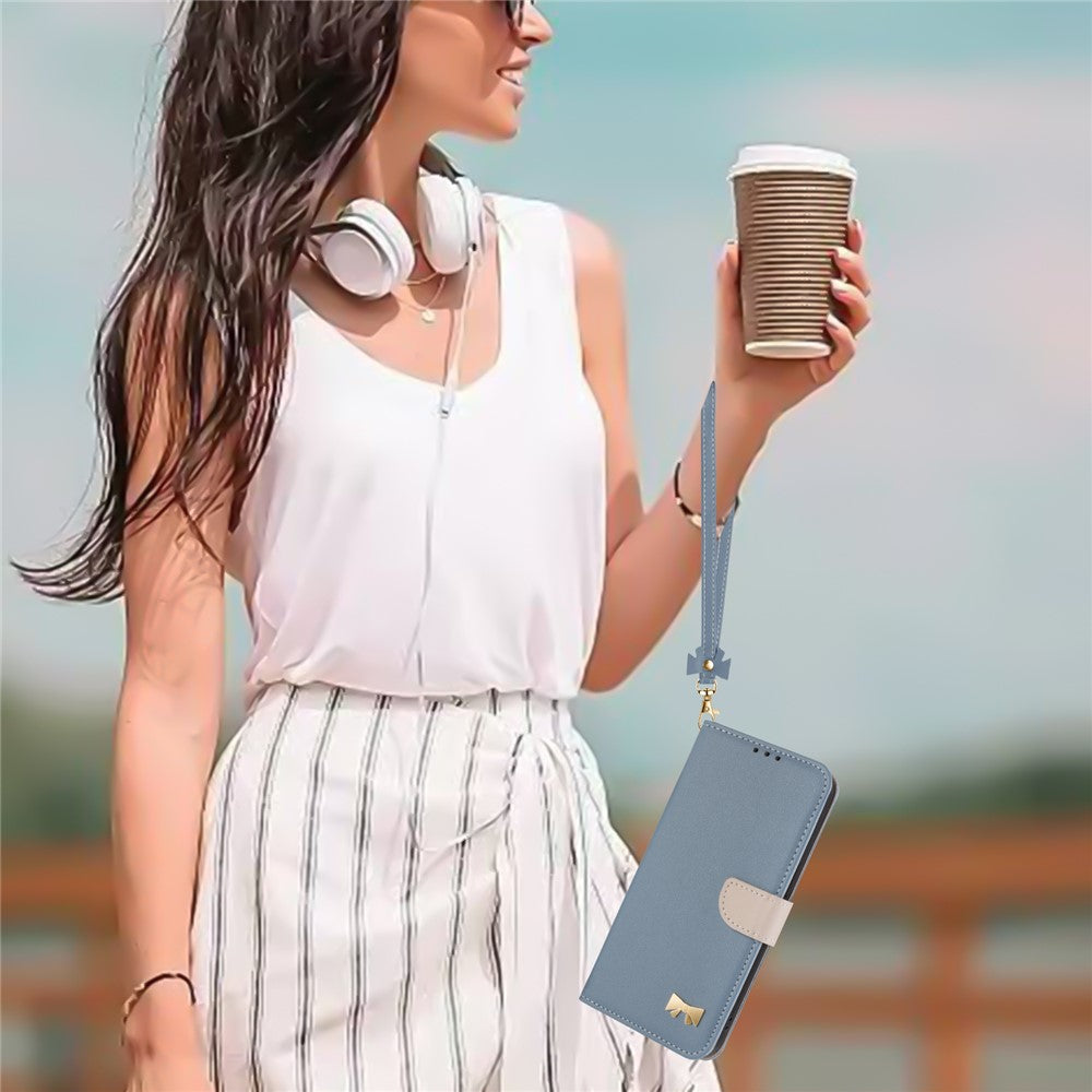 For Xiaomi Redmi Note 15 Pro 5G (Global) Case Bowknot Decor Wallet Leather Phone Cover with Wrist Strap - Baby Blue