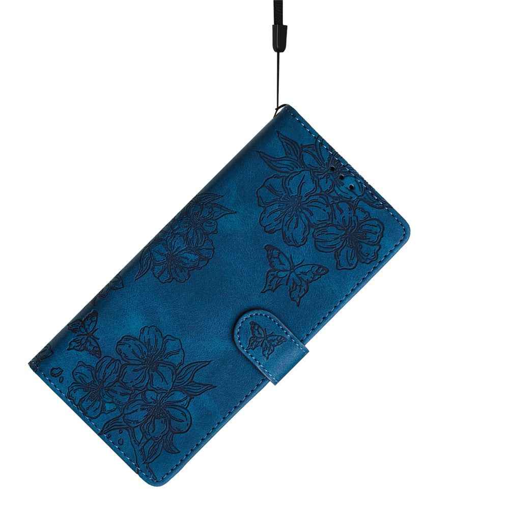 For Xiaomi 17 Pro Case Butterfly Flower Pattern Skin-Touch Leather Phone Cover - Blue