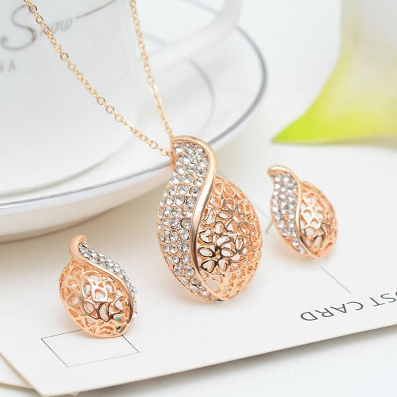 2pcs Simple Personality Lady Hollow Leaf S-line Necklace Earrings Jewelry Set (Gold)