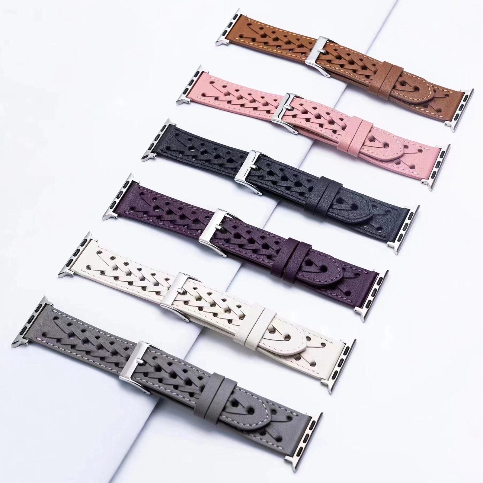 For Apple Watch Ultra 49mm / Series 8 45mm / 7 45mm / Series 6 / 5 / 4 / SE 44mm / SE (2022) 44mm / Series 1 / 2 / 3 42mm Hollow-out Woven Watch Strap Genuine Leather V-shaped Wrist Band - Purple